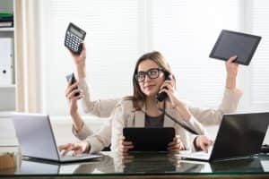 Multitasking Businesswoman In Office Multitasking Businesswoman In Office